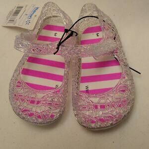 Walmart little girls clear jelly shoes. Size 3